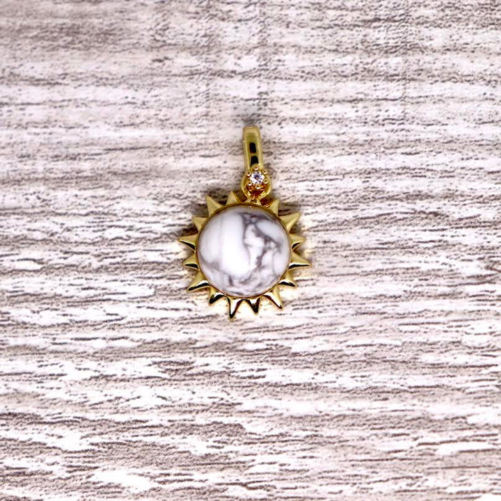 Gold plated Stone Sun pendant