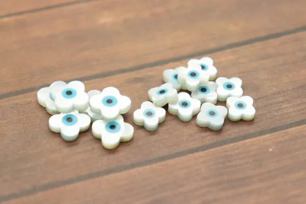 Single Natural Shell Blue Evil Eye Bead