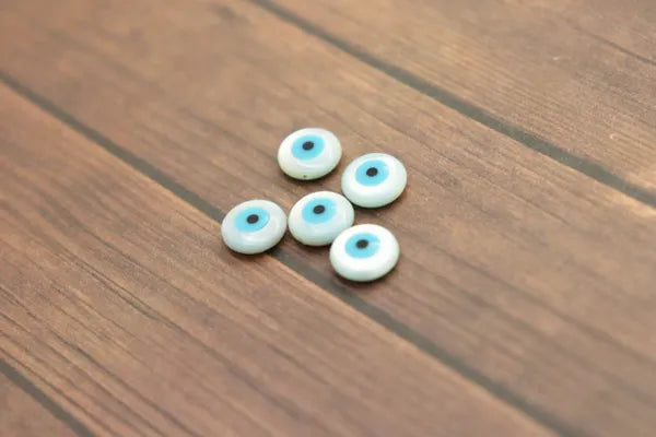 Single Natural Shell Blue Evil Eye Bead