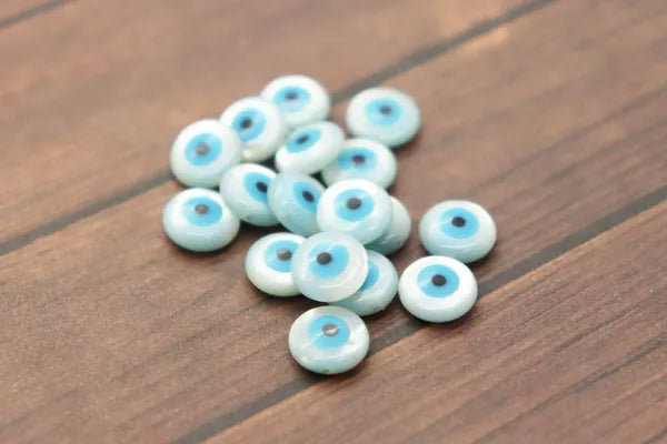 Single Natural Shell Blue Evil Eye Bead